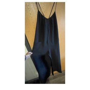 NWOT JUMPSUIT WITH POCKETS AND STRAPY BACK!